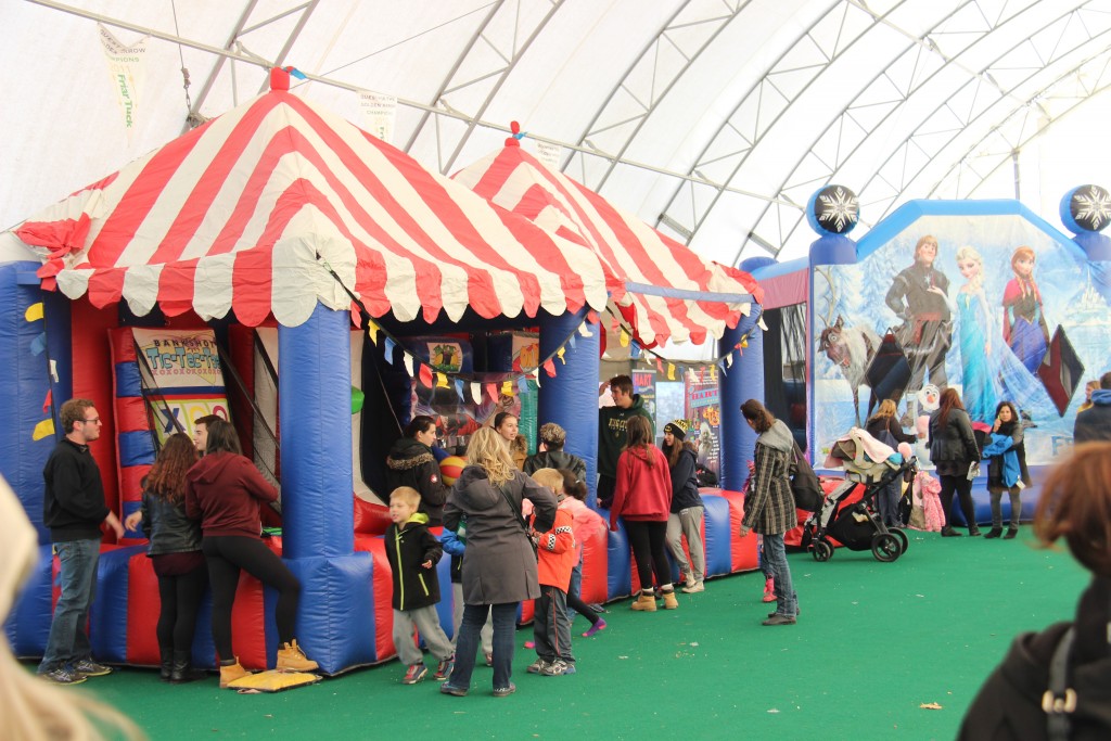 A carnival being held in Camp Robin Hood's Arrowdome building at Canada's oldest and largest private day camp