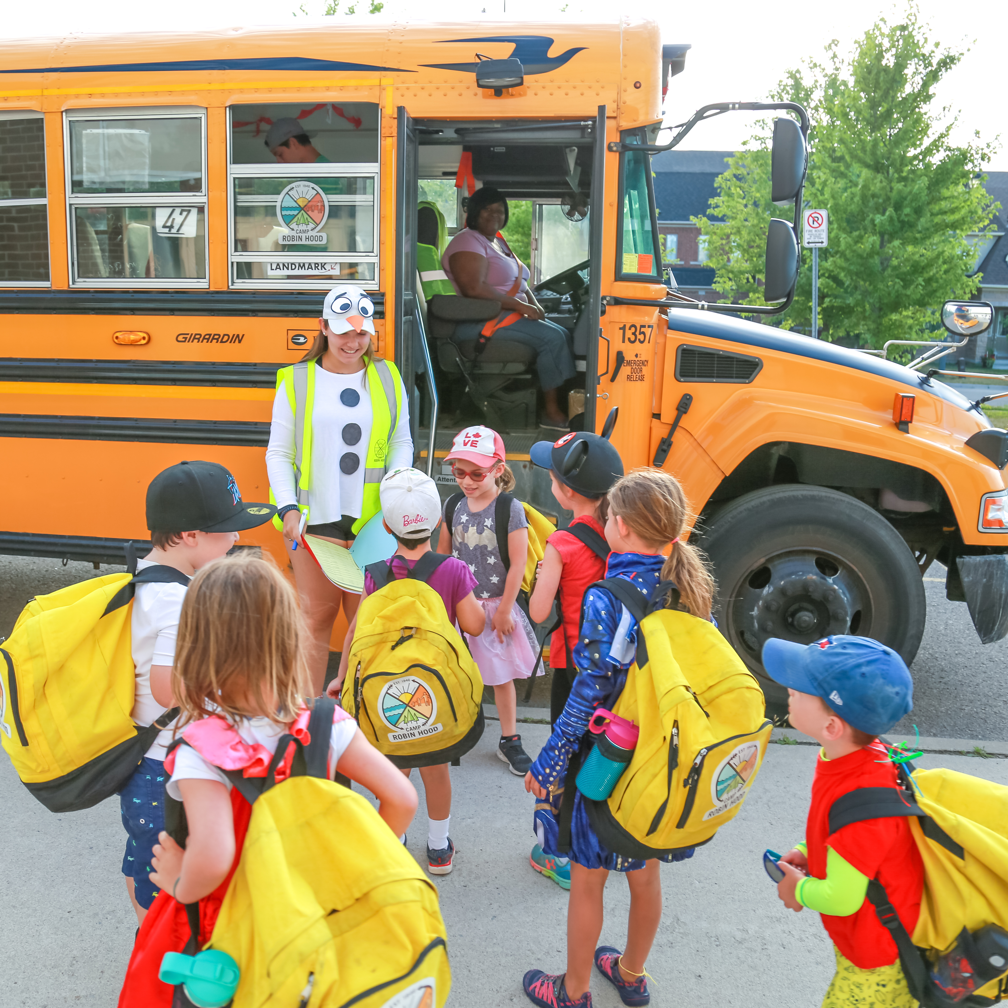 Boarding a school bus for a day at camp.